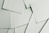 Wallpaper Scattered Sheets of White Paper