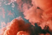 Wallpaper Orange Smoke on Blue Background