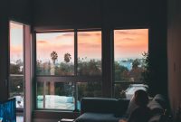 Wallpaper Woman Relaxing on Corner Sofa