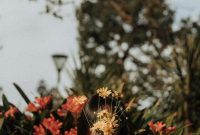 Wallpaper Woman Hiding Face with Yellow Flowers