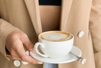 Wallpaper Person Holding White Ceramic Cup Filled with Coffee