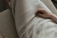 Wallpaper Woman in White Dress on Sofa