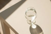 Wallpaper Clear Glass Ball on White Wooden Table