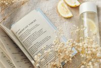 Wallpaper White Book Page with Yellow Flower Petals