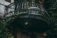 Wallpaper Black Metal Spiral Staircase on Brown Concrete Building