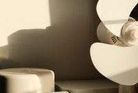 Wallpaper A Clock and Lamp on a Table