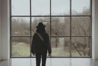 Wallpaper Person Standing by Large Window