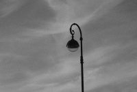 Wallpaper A Lamp Post with a Light on Top