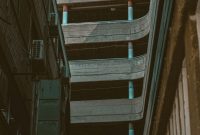 Wallpaper A Wooden Staircase with a Blue Sky