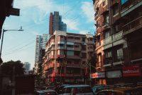 Wallpaper A City Street Filled with Lots of Tall Buildings