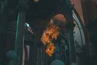 Wallpaper A Church with a Large Chandelier