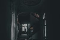 Wallpaper A Dark Hallway with a Staircase