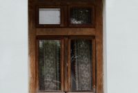 Wallpaper A Window with a Curtain