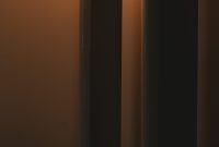 Wallpaper A Lamp Next to a Wall
