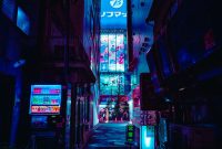 Wallpaper A Dark Alleyway with Neon Signs